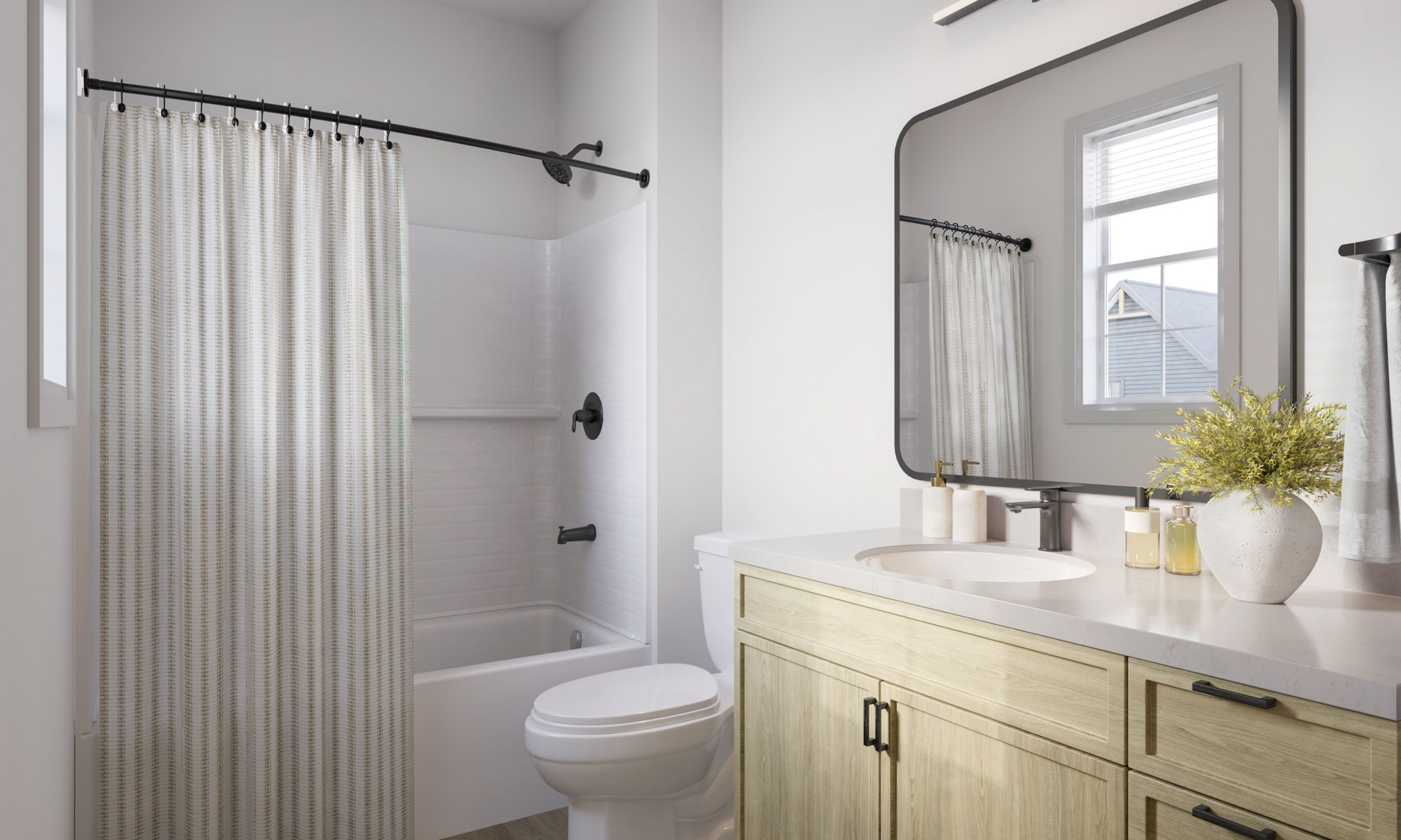 Chandelier Student Living Apartments Modern bathroom with a bathtub, shower curtain, toilet, large mirror, sink, and wood cabinets on a light wood floor.