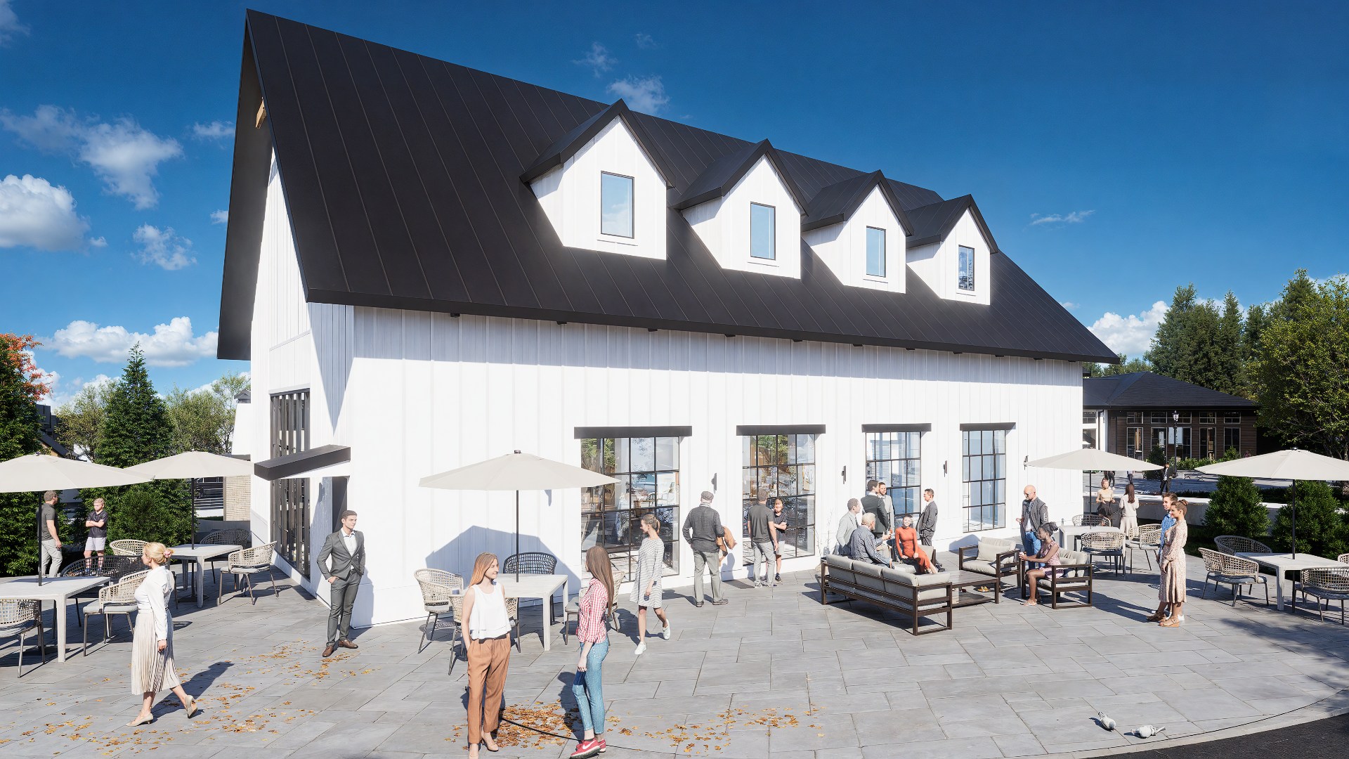 modern white barn building with patio at chandelier in oxford ms