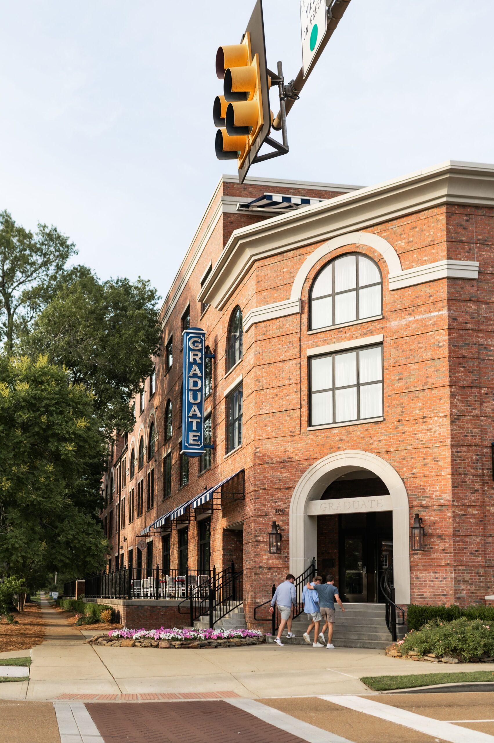 graduate hotel brick facade entrance scaled
