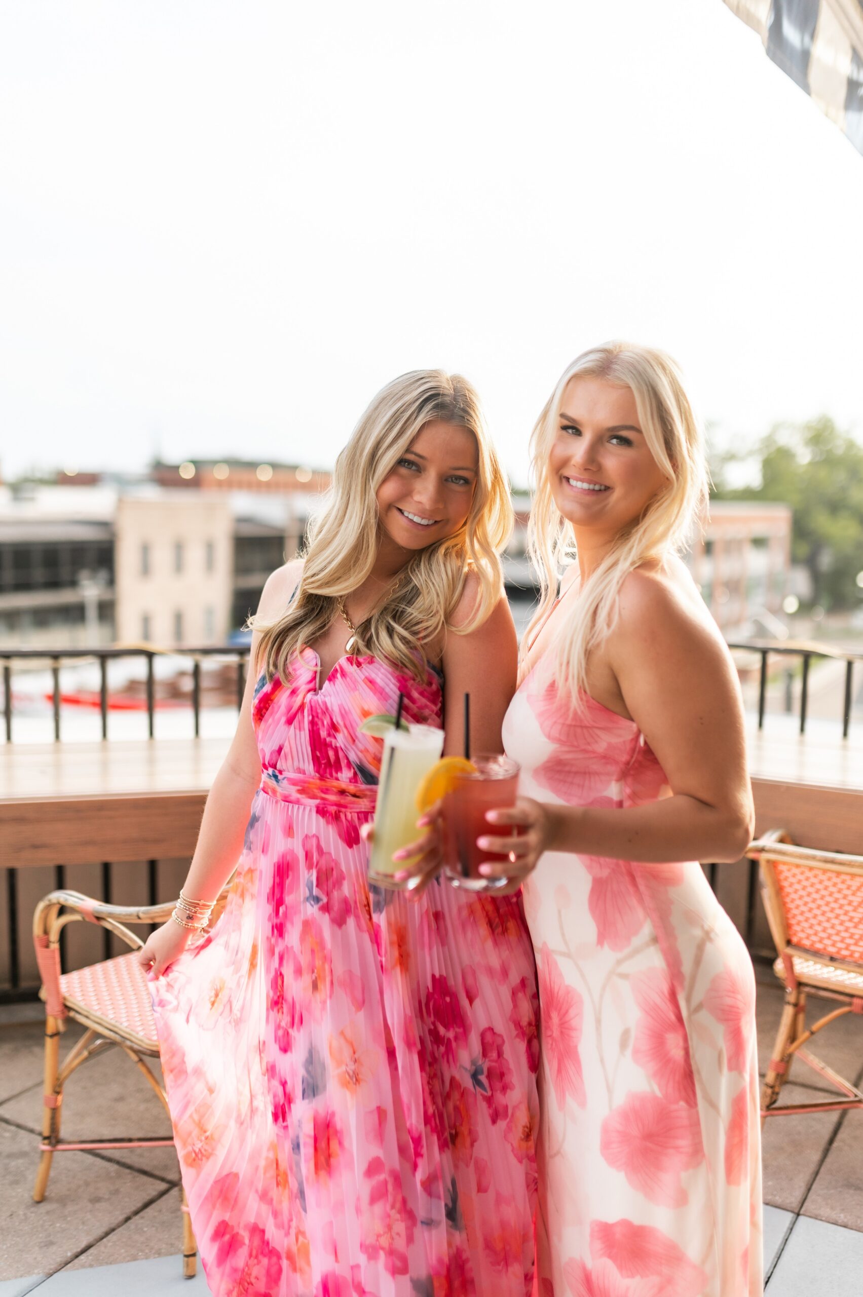 rooftop patio socializing with cocktails scaled